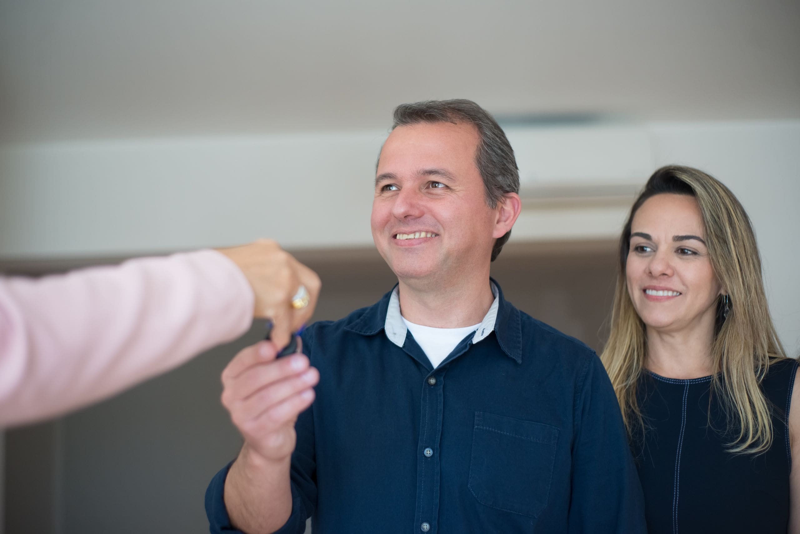 Family receiving the keys to their newly completed home on possession day